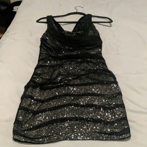 Black and silver sequin dress.